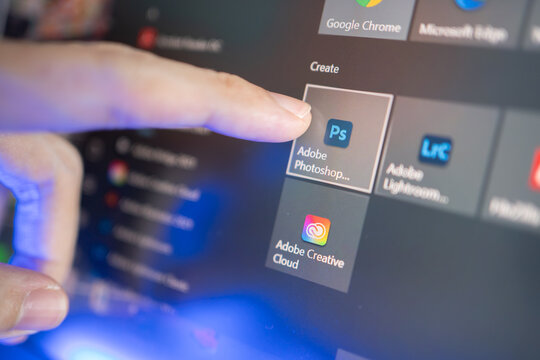 Bangkok, Thailand - October 5, 2021 : Adobe Photoshop and Adobe Creative Cloud app icons on Microsoft Windows 10.