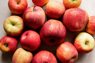 Fototapeta na wymiar Red apples, natural sweet healthy apple fruits, rustic background