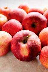 Fototapeta na wymiar Red apples, natural sweet healthy apple fruits, rustic background