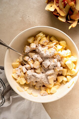 Cutted and peeled apples. Cooking an apple pie or tart. Step by step recipe.