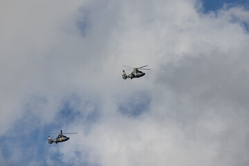 HONG KONG, CHINA - August 07, 2020: People's Liberation Army helicopters patrol over the sky of...