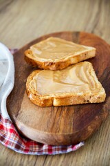 Peanut Butter Sandwich on Whole Wheat Bread. Vertical composition