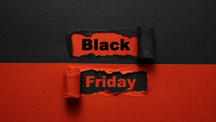 Black Friday text on torn paper. Big sale concept. Copy space