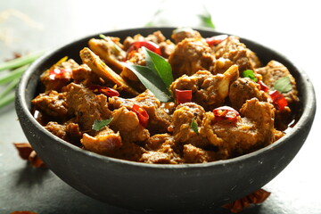 Homemade INDAN BEEF FRY, FRIED MEAT WITH SPICES.