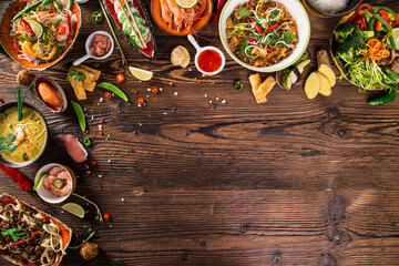 Various of asian meals on rustic wooden background , top view , place for text. Asian food concept.