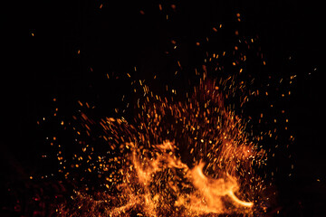 Fototapeta na wymiar Fire Flames Isolated on Black Background, close-up.