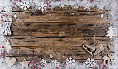 Christmas decoration on wooden background, lots of copy space for product or text.