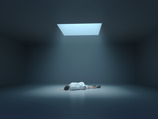 Fototapeta man lying on the floor in a dark room obraz