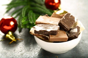 Sugar free Homemade chocolates  on a holiday backdrop.