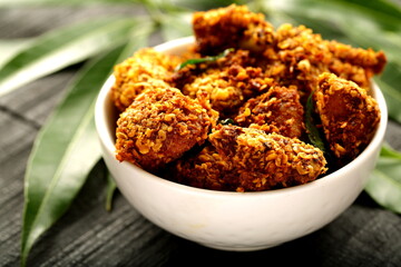Bowl of spicy crispy fried broasted chicken,