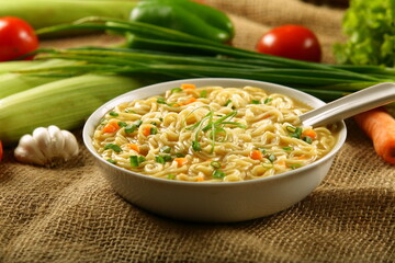 Delicious and healthy vegetable noodle soup with organic vegetables.