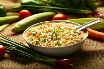 Homemade delicious breakfast , chicken noodle soup.