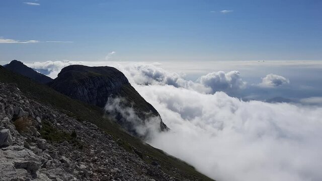 Waving clouds in the valley. Timelapse from the top of the hill