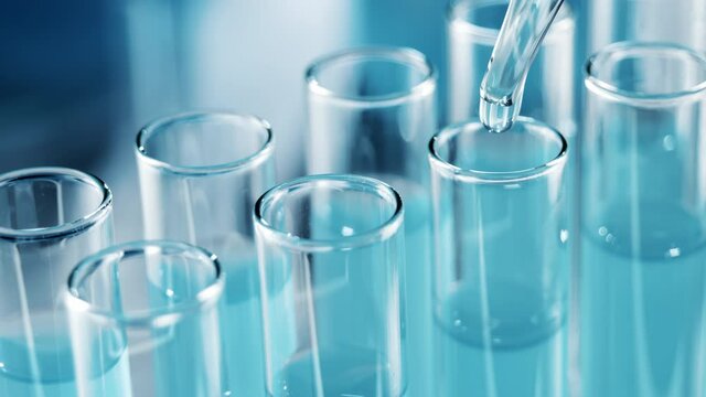 Medical Development Laboratory: Filling Test Tube with Liquid, Conducting Experiment. Advanced Scientific Lab for Medicine, Biotechnology Development. Close-up Shot
