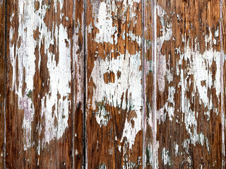 Obraz premium Old shabby wooden white painted background. Peeling paint. Texture of wood. Vintage wood