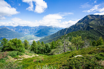 Fototapeta na wymiar Mountain peak offering Lake Como panoramas and a summer hiking trails
