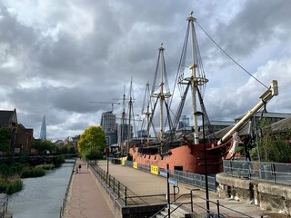 London, England. Tobacco docks in Wapping area in London. Old pirate ships “Three sisters”,...