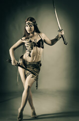  warrior woman holding sword in her hand