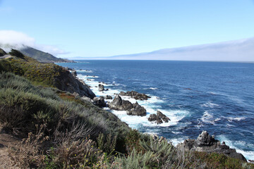 waves crashing on rocks