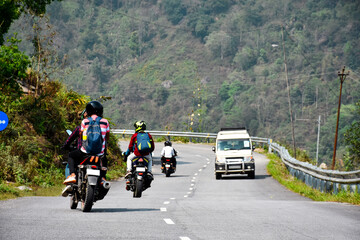 Bikers , enjoying the thrill of curvy highway.