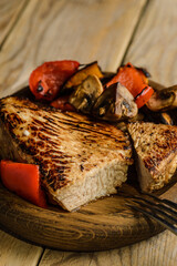 turkey fillet fried on wooden