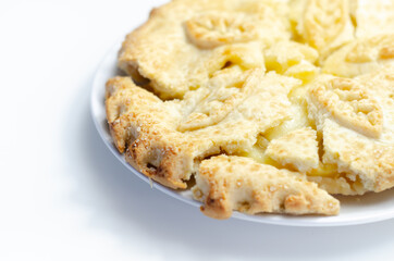 Traditional apple pie, Bramley apple filling in shortcrust pastry, topped with demerara sugar glaze