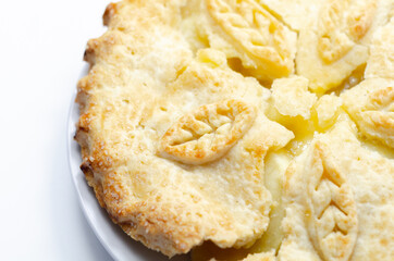 Traditional apple pie, Bramley apple filling in shortcrust pastry, topped with demerara sugar glaze