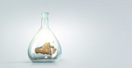 Landscape with mountain inside glass bottle . Mixed media
