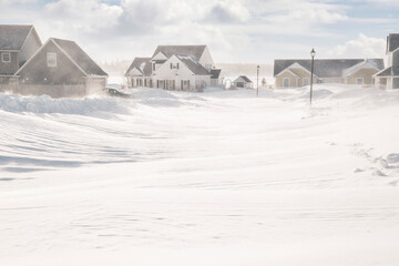 Unplowed roads after a blizzard in a North American suburban neighborhood. - 462614287