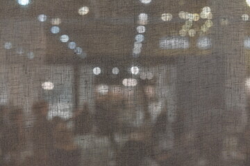 secret corporate meeting in the office behind half opacity fabric