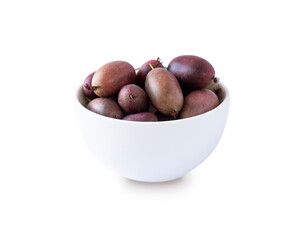 Actinidia isolated on white background. Actinidia in a bowl with copy space for text. Kiwi fruit actinidia. Baby kiwi fruits on white background.