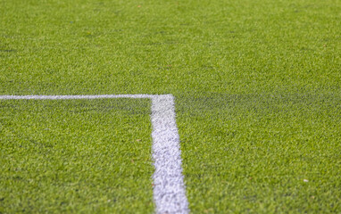 white marking strip on a football field
