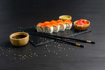 California Maki Sushi with Masago - Roll made of Crab Meat, Avocado, Cucumber inside