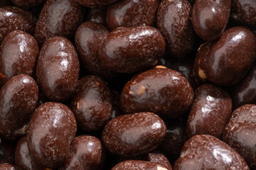 Detailed and large close up shot of chocolate covered fruits.
