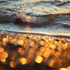 Sea shore at sunset, close-up. Pebbles, storm waves. Abstract background, details blurred in bokeh. Blue, yellow, orange, pink colors. Soft sunlight, golden hour. Peace, meditation, tranquility themes