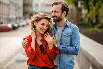 man and woman on romantic vacation walking together