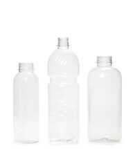 three different empty plastic bottles isolated on white background. production of new containers