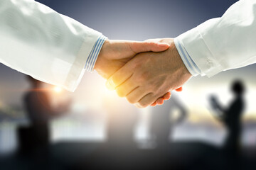 Partnership concept. Image of handshake