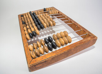 Old wooden abacus on pure white background