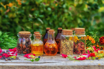 Bottled herbal and flower tinctures. Selective focus.