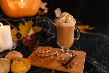 Halloween Latte. Spicy Latte Coffee in Halloween Decorations. Pumpkin, Latte, Halloween, Commercial Content