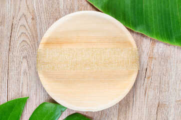 Kitchenware made from dried betel nut leaf palm, natural material.
