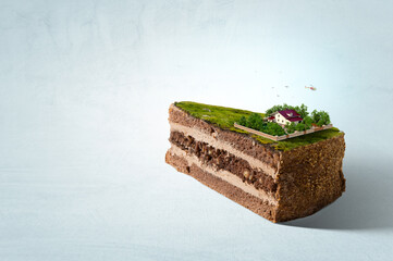 Green landscape with a house on top of cake