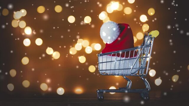 Santa Claus hat in shopping cart and Christmas Lights