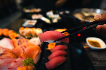 Sashimi and sashimion a plate in a Japanese restaurant