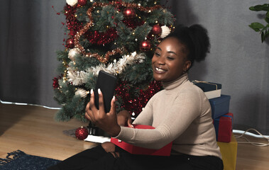 Young happy and worried woman calling her boyfriend on smartphone video call to ask him where he is...