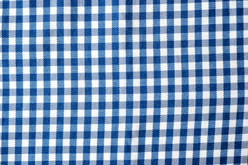 Checkered cloth, pattern of the small cages on the fabrick, seamless fabric cage as texture or background, top view