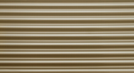 closeup of shiny new golden bronze metallic blinds shutters - corrugated sheet - copy space