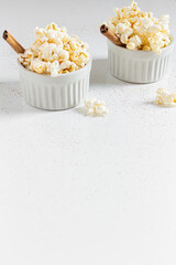 Cozy and aesthetic beige composition with popcorn. Autumn, winter food concept.