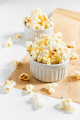 Cozy and aesthetic beige composition with popcorn. Autumn, winter food concept.